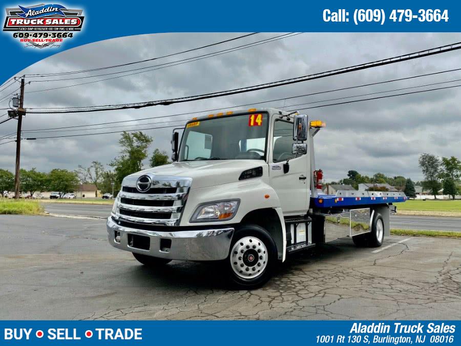 The 2014 Hino 258 Roll Back Tow Truck photos