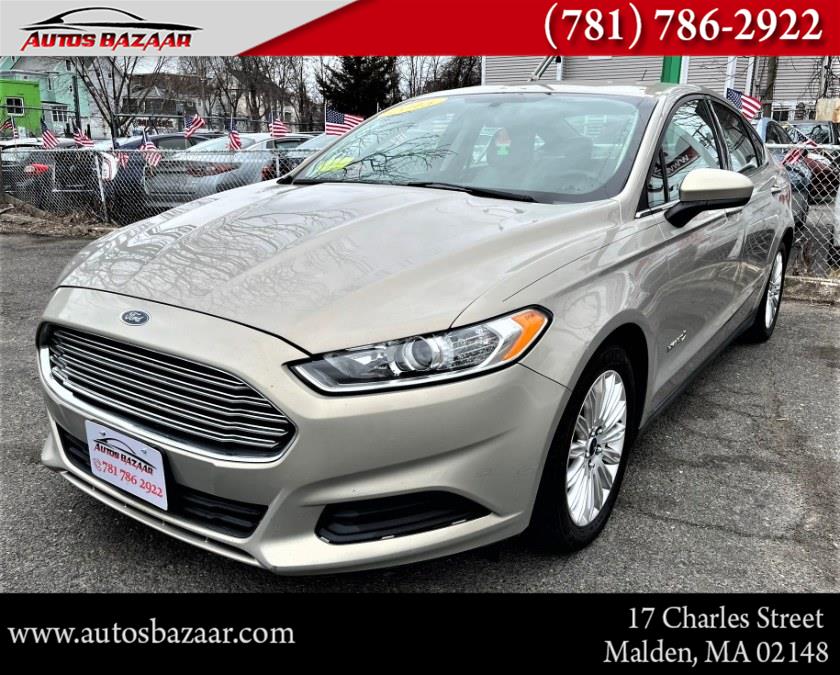 The 2015 Ford Fusion 4dr Sdn S Hybrid FWD photos