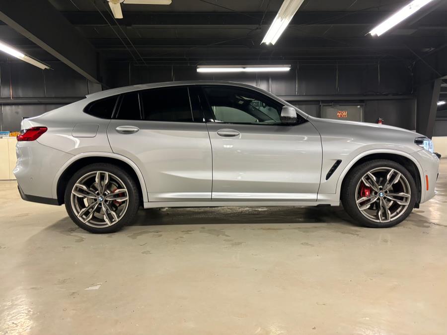 The 2021 BMW X4 M40i Sports Activity Coupe photos