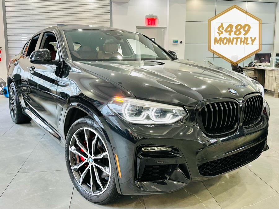 The 2021 BMW X4 M40i Sports Activity Coupe photos