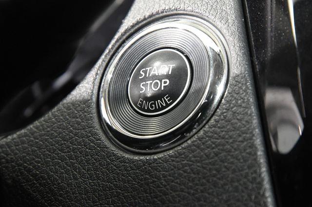 2016 Nissan Rogue SV w/ Nav & Blind Spot photo