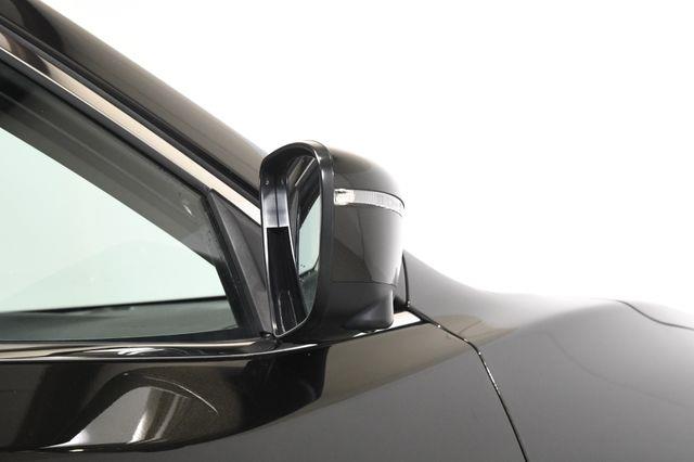 2016 Nissan Rogue SV w/ Nav & Blind Spot photo