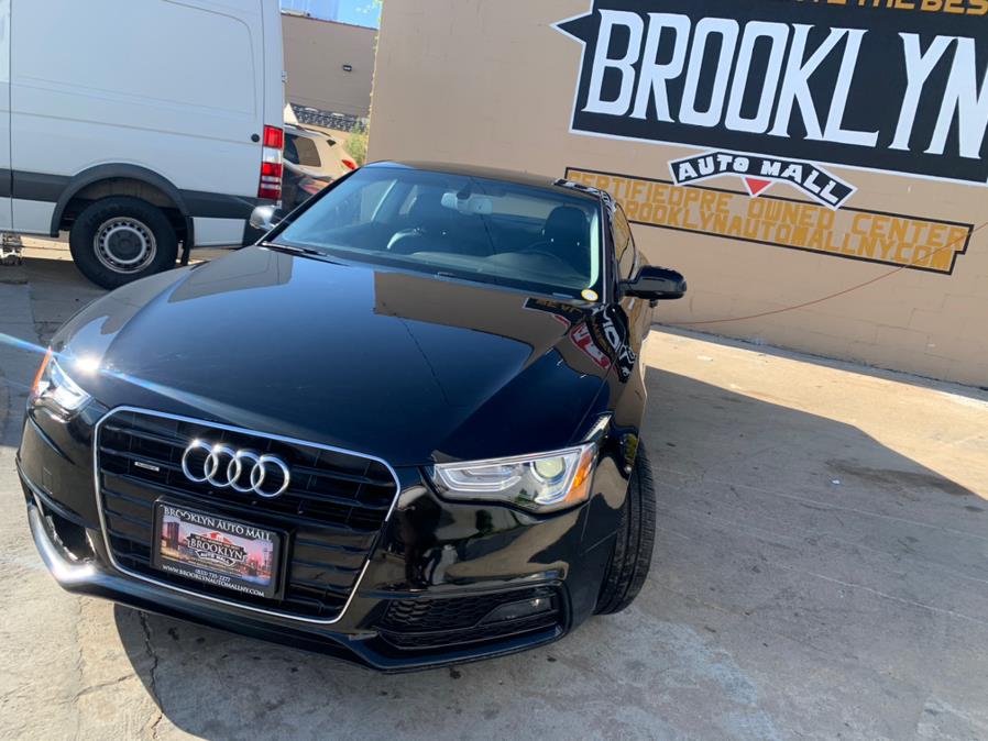 2015 Audi A5 2dr Cpe Auto quattro 2.0T Prem photo