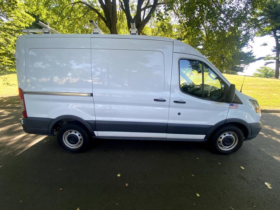 2015 Ford TRANSIT 150 3dr SWB Medium Roof Cargo  photo