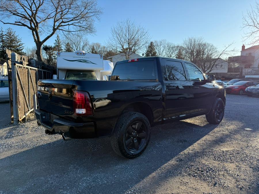 2015 RAM 1500 4WD Crew Cab 140.5