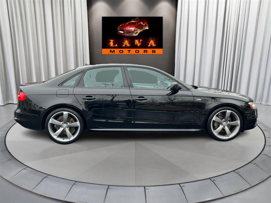 2015 Audi A4 4dr Sdn Man quattro 2.0T Prest photo