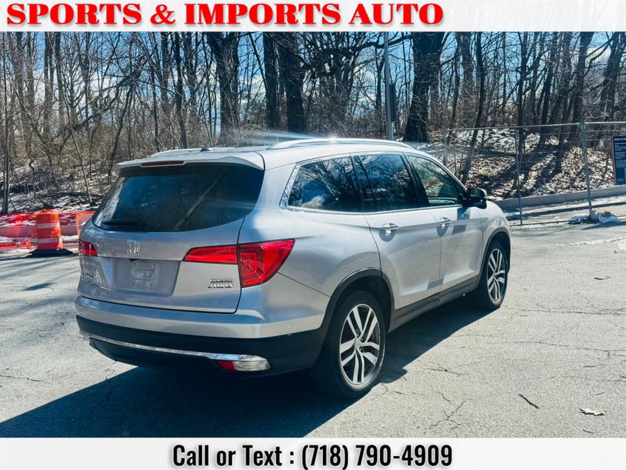 2016 Honda Pilot AWD 4dr Touring w/RES & Navi photo