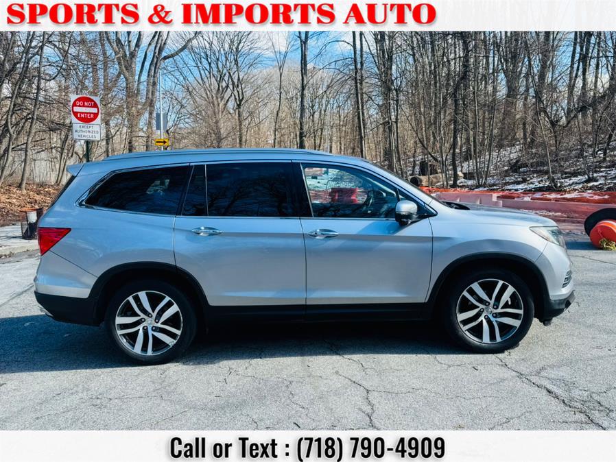 2016 Honda Pilot AWD 4dr Touring w/RES & Navi photo