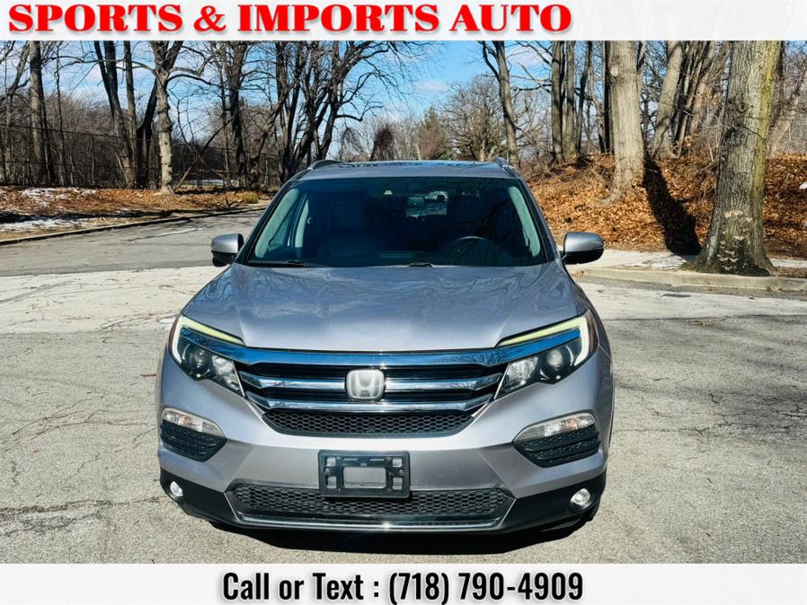 2016 Honda Pilot AWD 4dr Touring w/RES & Navi photo