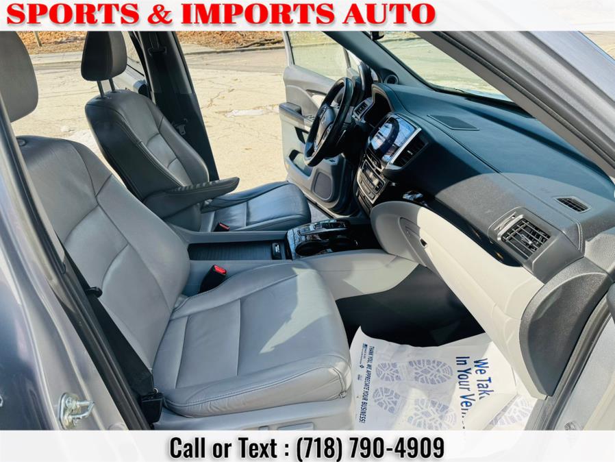 2016 Honda Pilot AWD 4dr Touring w/RES & Navi photo