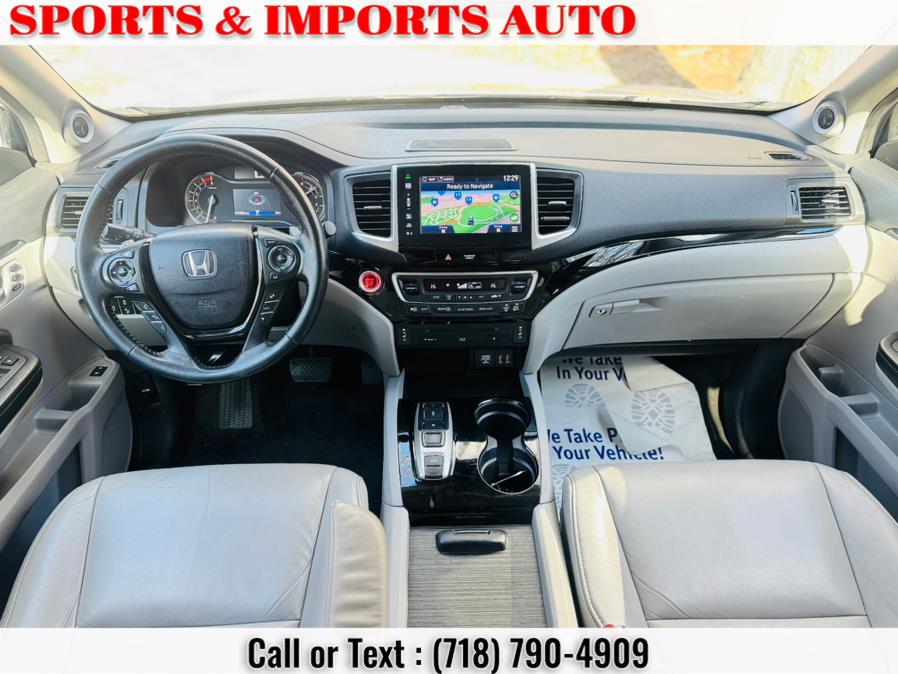 2016 Honda Pilot AWD 4dr Touring w/RES & Navi photo