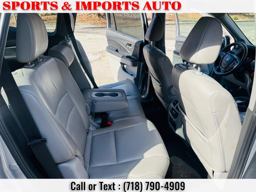 2016 Honda Pilot AWD 4dr Touring w/RES & Navi photo