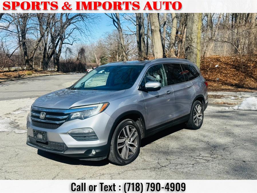 2016 Honda Pilot AWD 4dr Touring w/RES & Navi photo