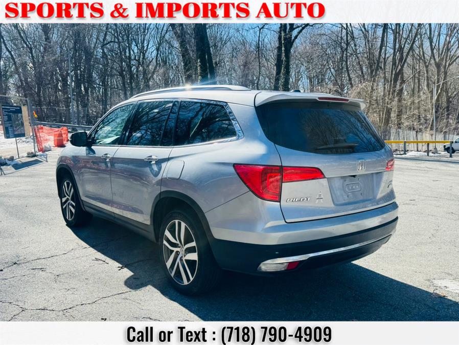 2016 Honda Pilot AWD 4dr Touring w/RES & Navi photo