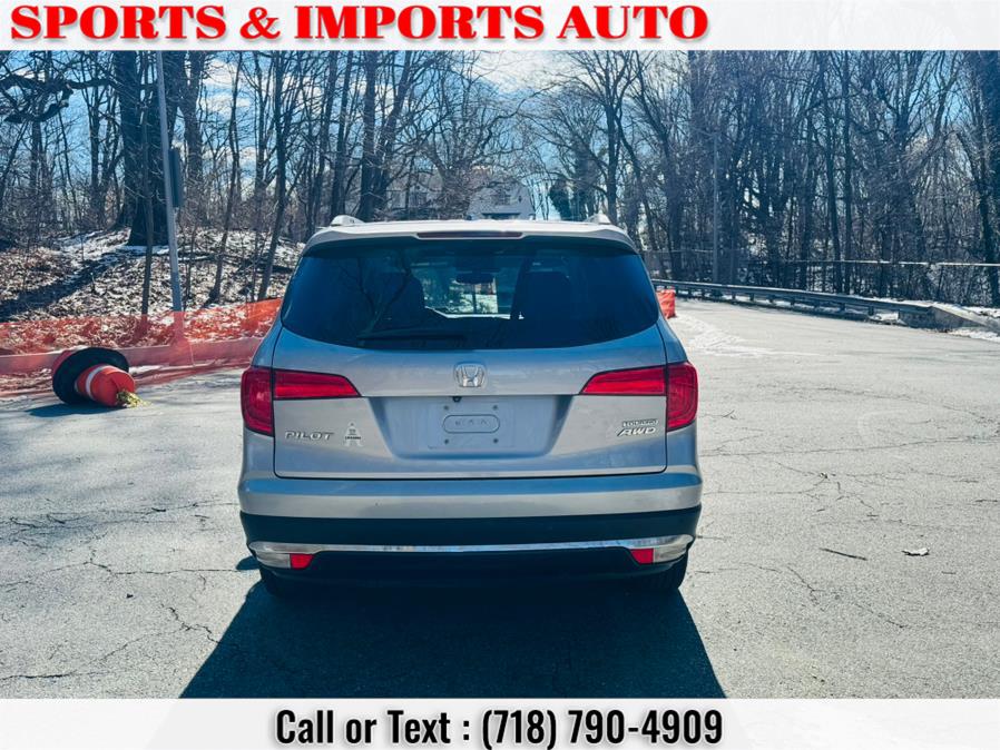 2016 Honda Pilot AWD 4dr Touring w/RES & Navi photo