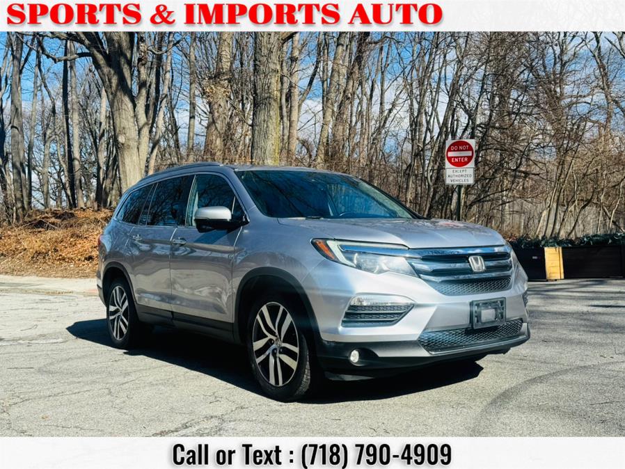 2016 Honda Pilot AWD 4dr Touring w/RES & Navi photo