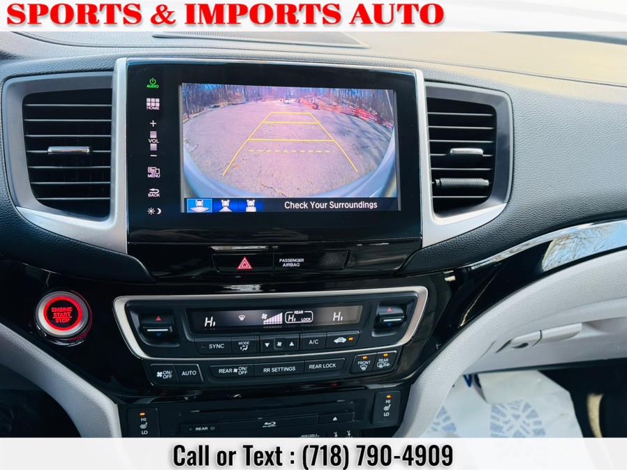2016 Honda Pilot AWD 4dr Touring w/RES & Navi photo