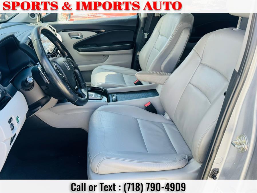 2016 Honda Pilot AWD 4dr Touring w/RES & Navi photo