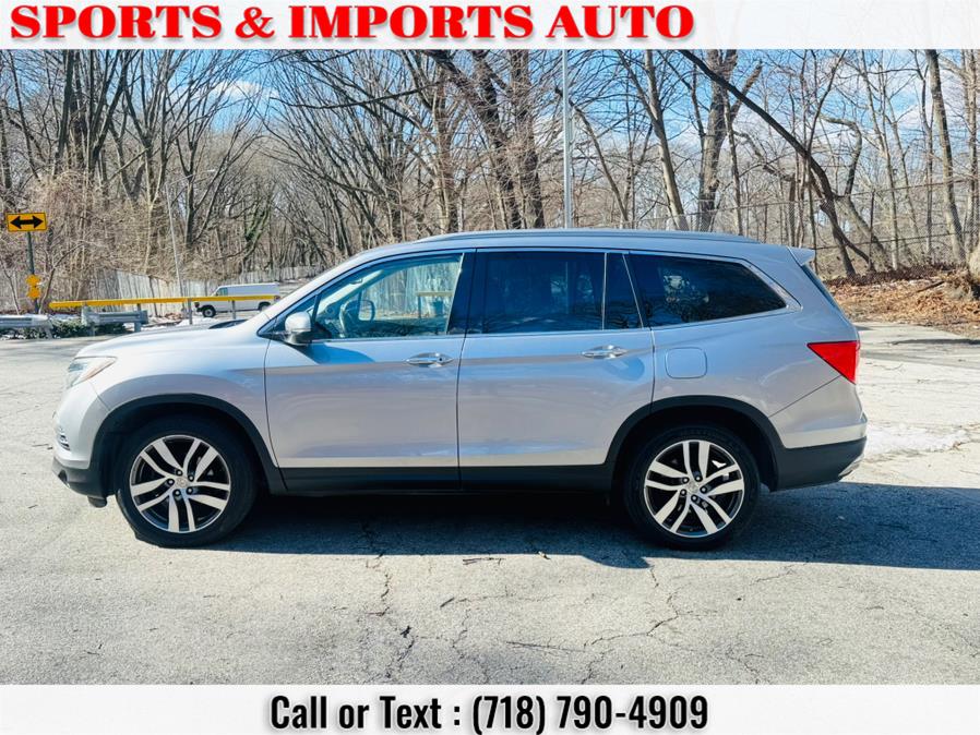 2016 Honda Pilot AWD 4dr Touring w/RES & Navi photo