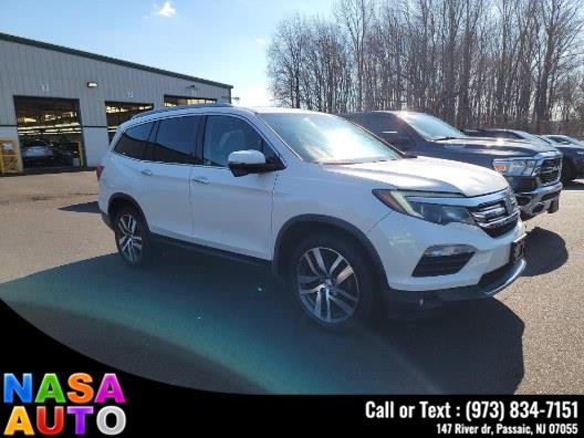 2016 Honda Pilot AWD 4dr Touring w/RES & Navi photo