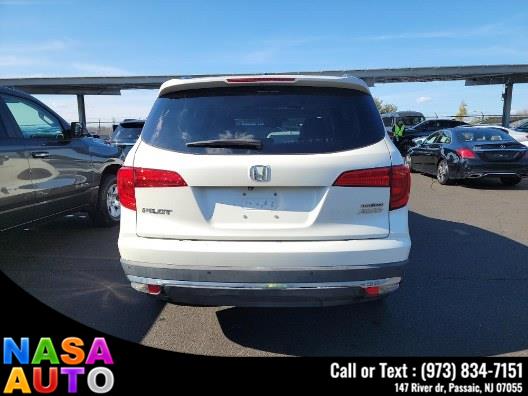2016 Honda Pilot AWD 4dr Touring w/RES & Navi photo