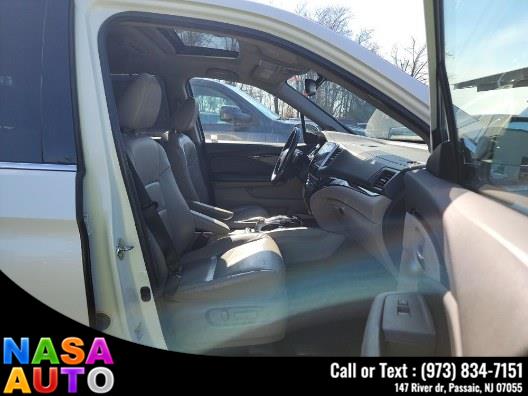 2016 Honda Pilot AWD 4dr Touring w/RES & Navi photo