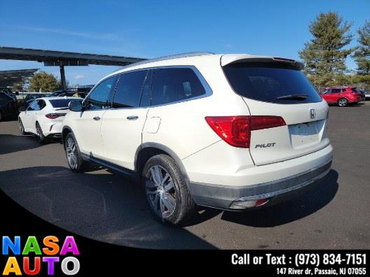2016 Honda Pilot AWD 4dr Touring w/RES & Navi photo