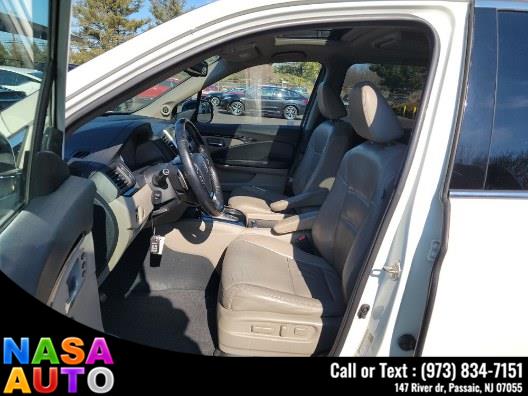 2016 Honda Pilot AWD 4dr Touring w/RES & Navi photo