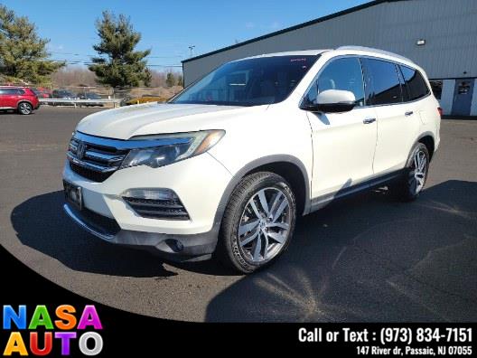 2016 Honda Pilot AWD 4dr Touring w/RES & Navi photo