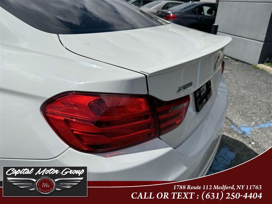 2015 BMW 4 Series 2dr Cpe 428i xDrive AWD SULEV photo