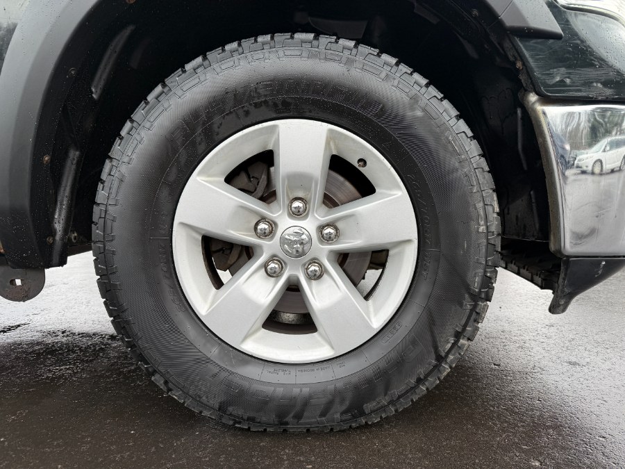 2015 RAM 1500 4WD Quad Cab 140.5