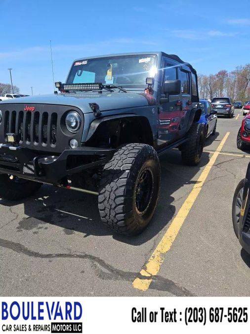 2015 Jeep Wrangler Unlimited Sport SUV 4D photo