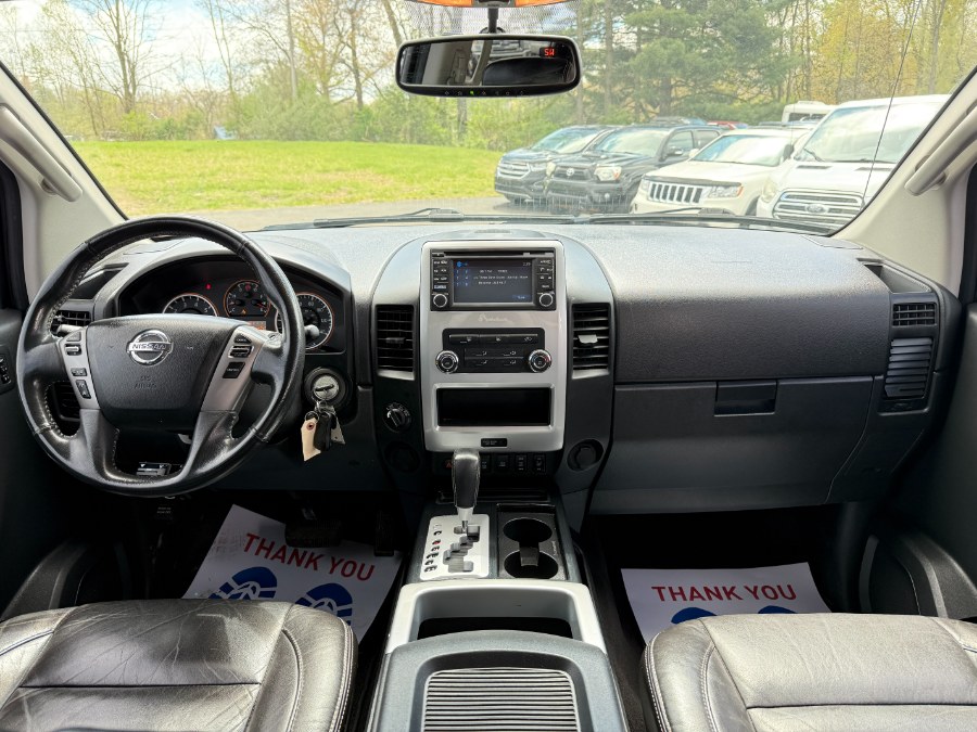 2015 Nissan Titan 4WD Crew Cab SWB SL photo