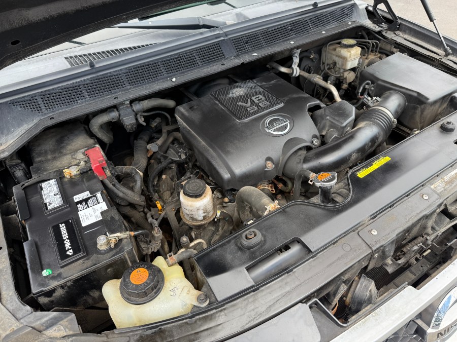 2015 Nissan Titan 4WD Crew Cab SWB SL photo