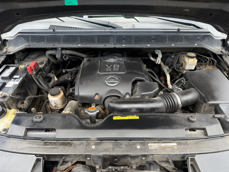 2015 Nissan Titan 4WD Crew Cab SWB SL photo