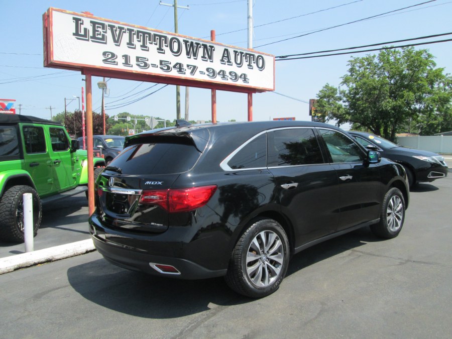 2016 Acura MDX SH-AWD 4dr w/Tech photo