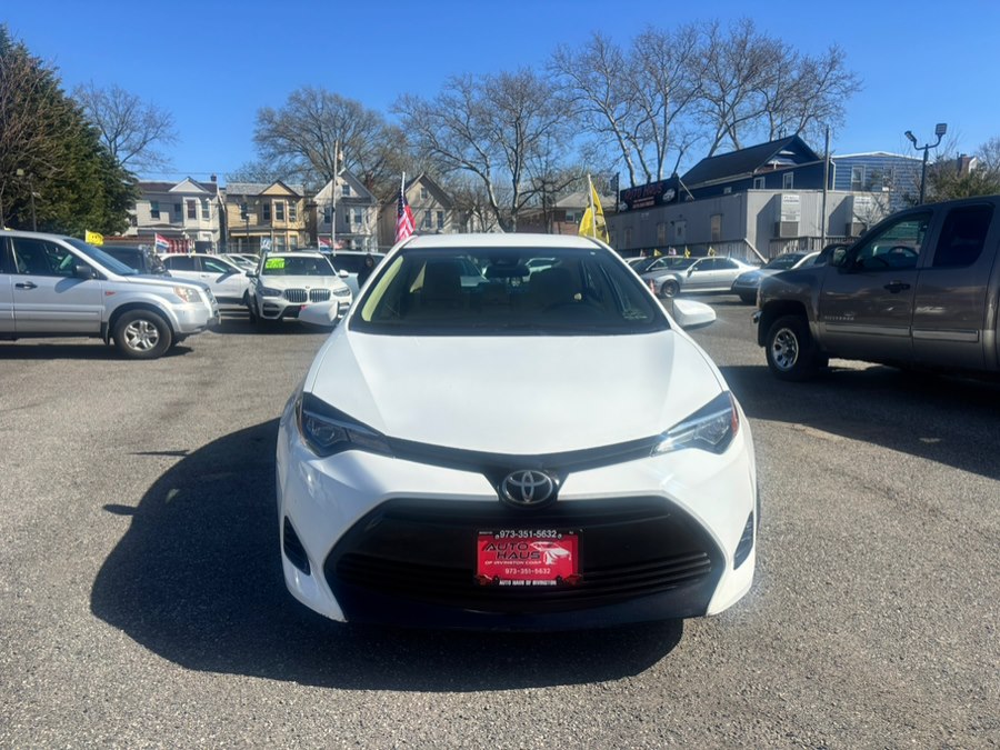 Super White 2019 Toyota Corolla LE Sedan Front-Wheel Drive Automatic