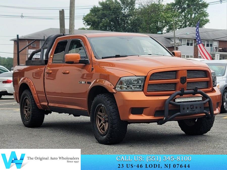Orange (Mango Tango Pearl) 2010 Dodge RAM 1500 Pickup Truck Automatic